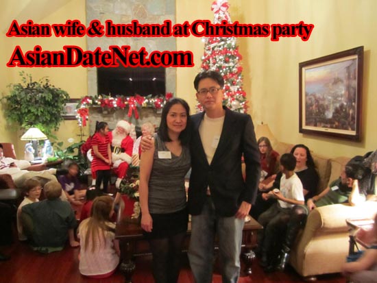 Asian wife & husband at Christmas party